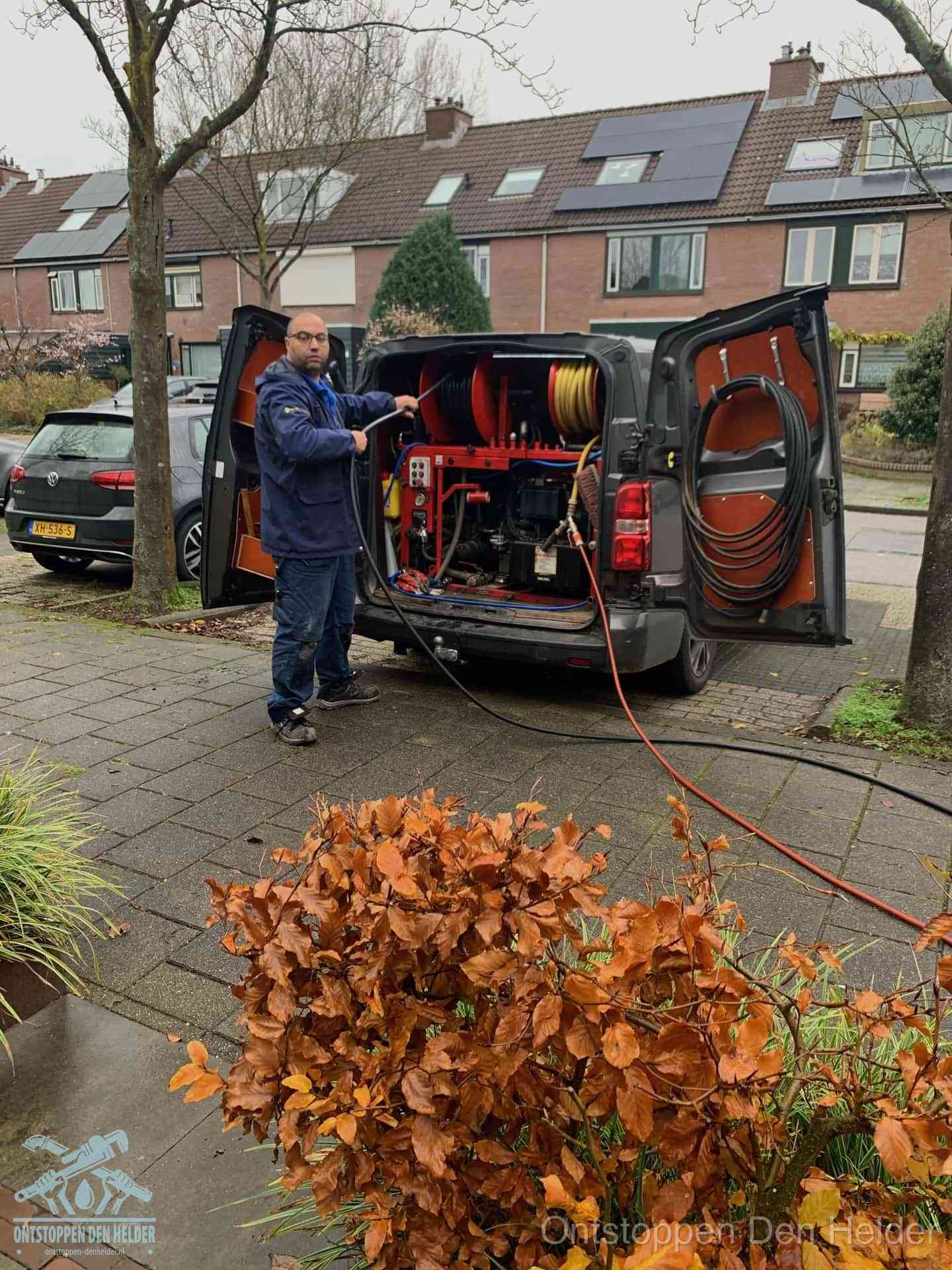 Rioolservice in de wijk in Den Helder
